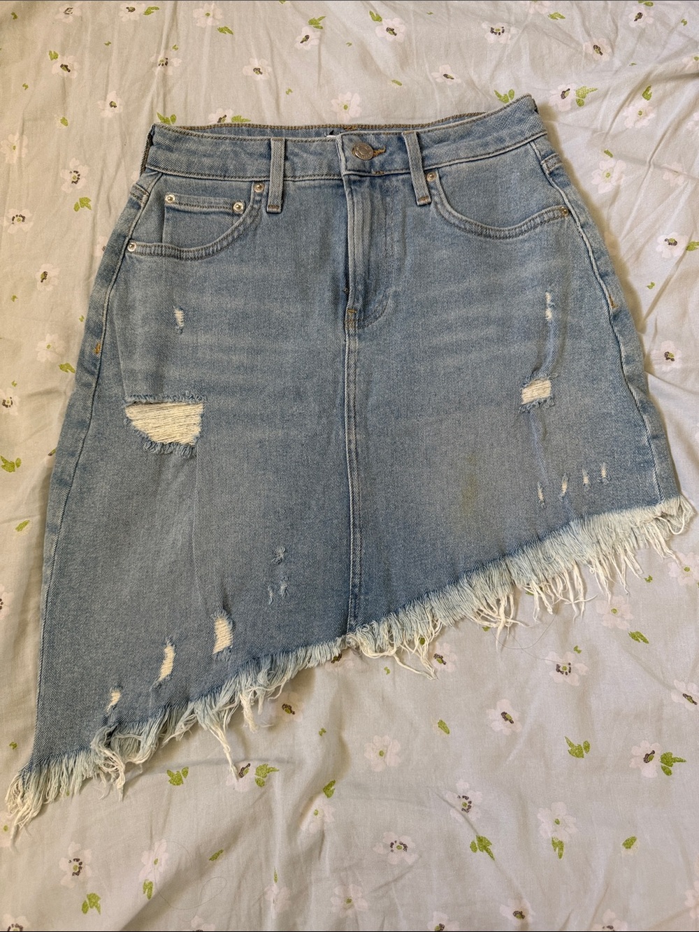 Asymmetrical distressed denim skirt